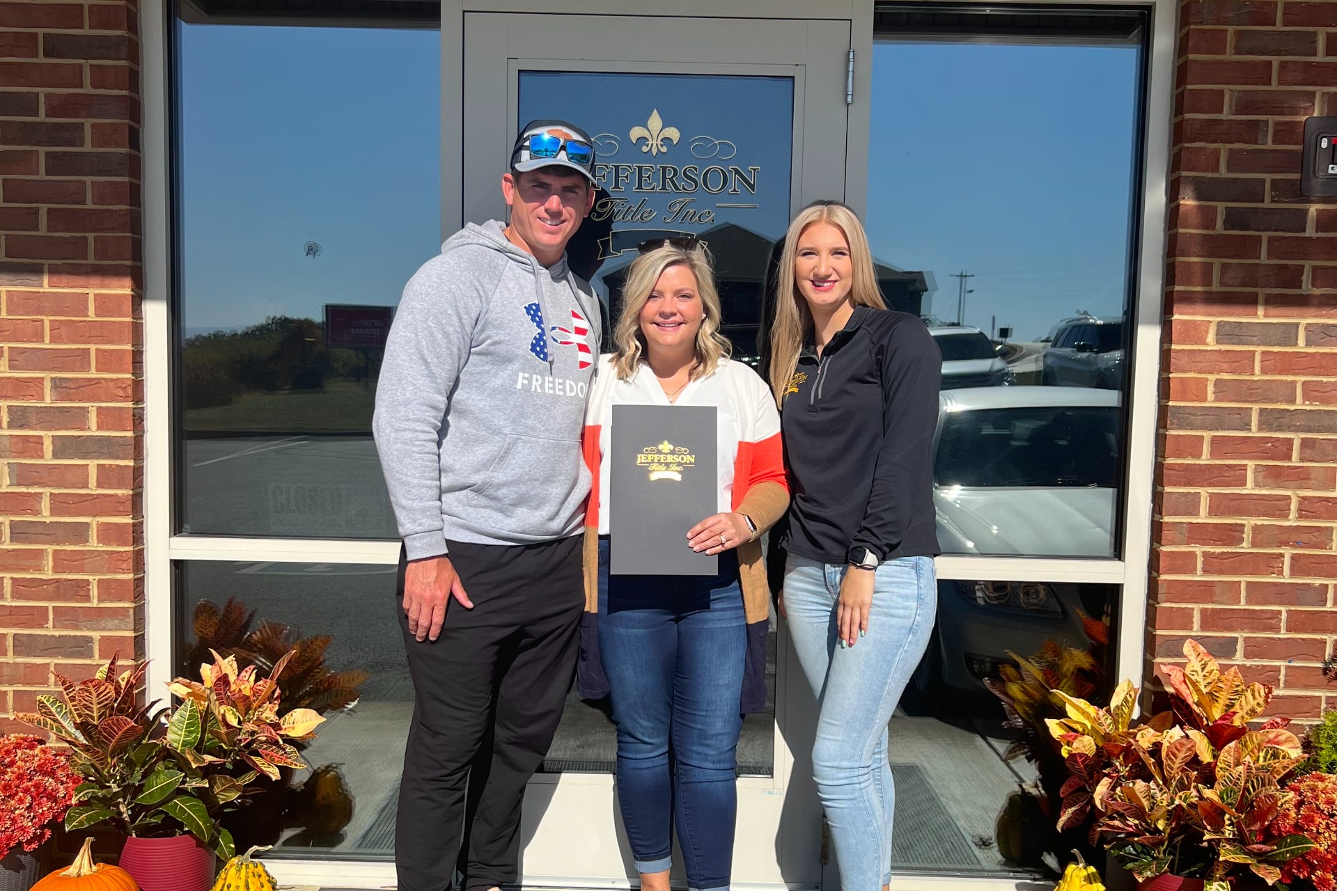 Couple receiving new house title